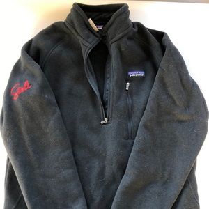 Patagonia fleece sweater with stoli logo on arm